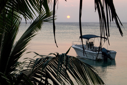 Boot im Sonnenuntergang - Foto, Druck, Poster, Leinwand